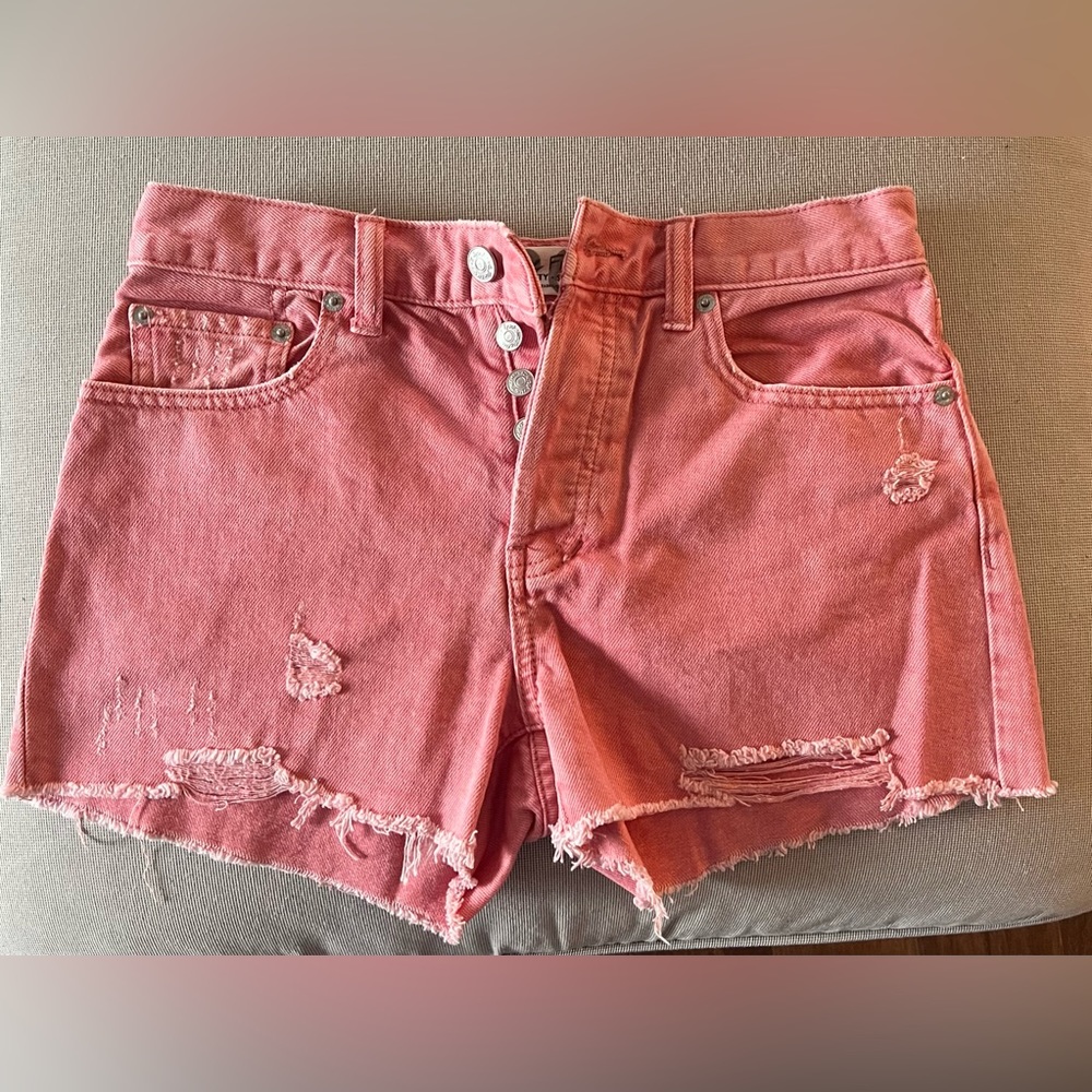 We The Free pink jean shorts.